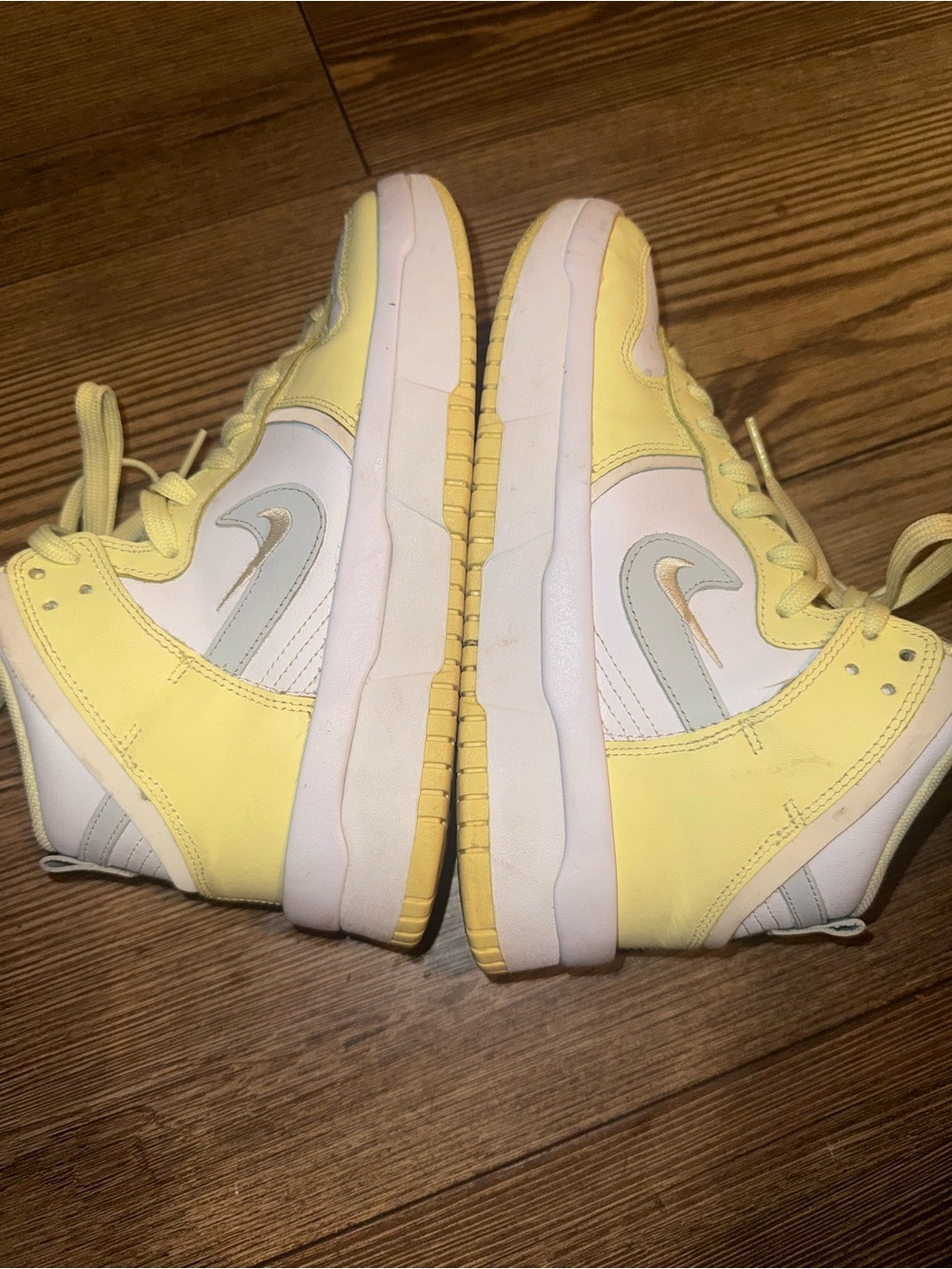 Nike Yellow and White Low-Top Sneakers with Silver Swoosh